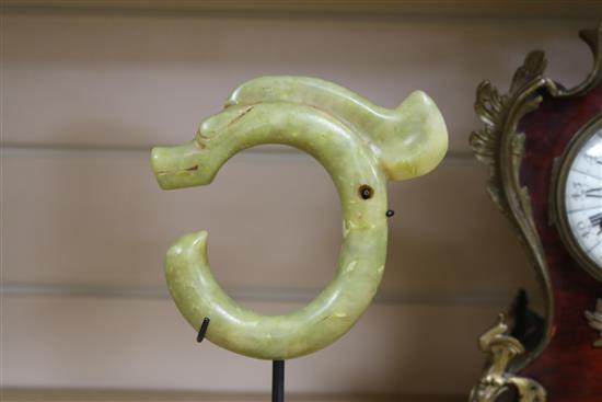 A Chinese yellow carved stone pendant